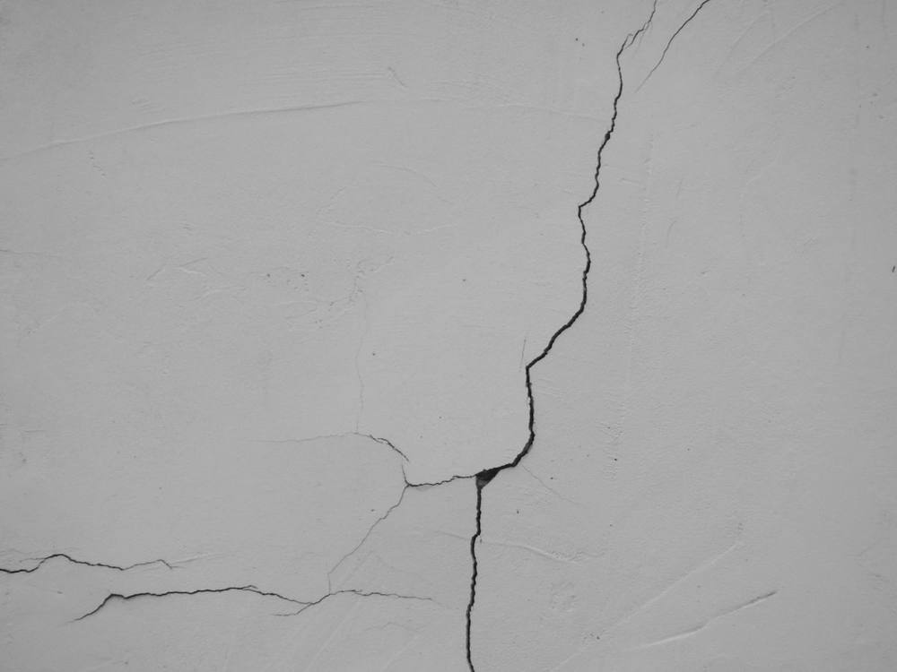 A crack running through a rendered wall