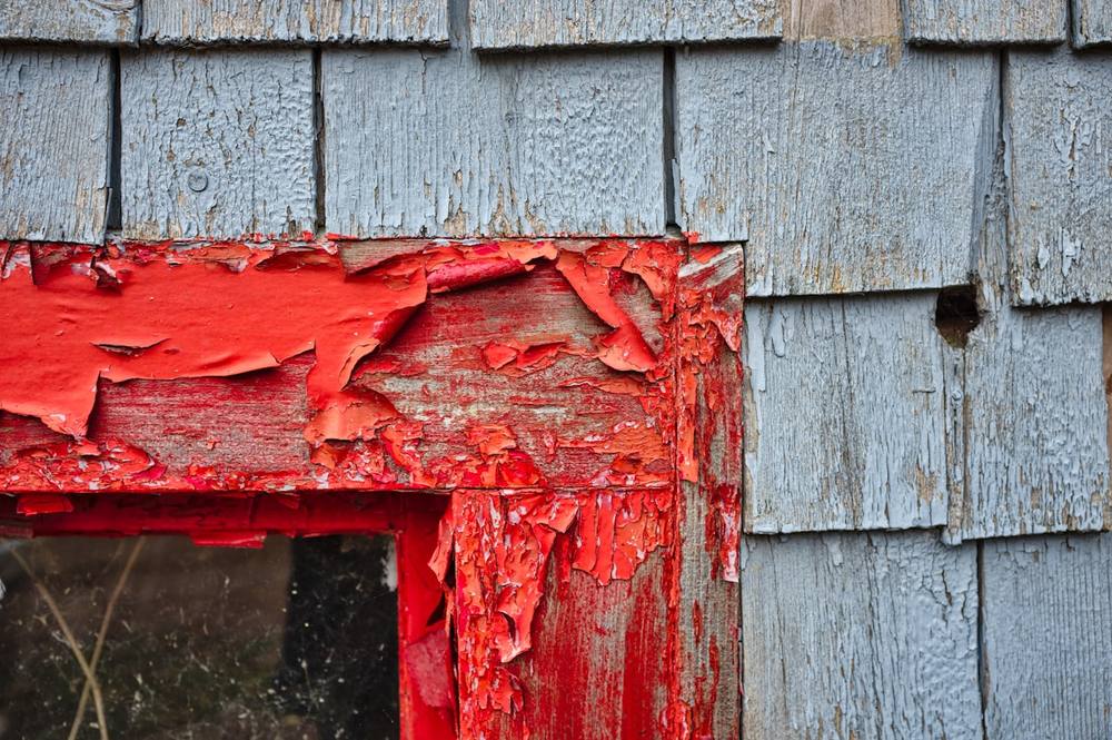 Weathered, peeling paint before preparation